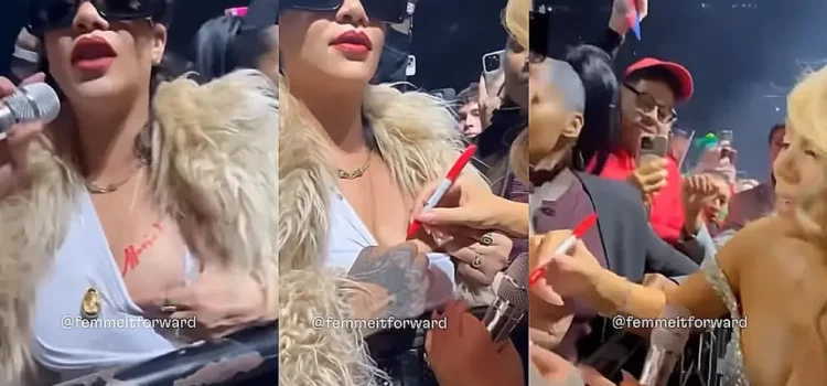 Mariah Carey firma un autógrafo en el pecho de Rihanna durante un concierto de Navidad